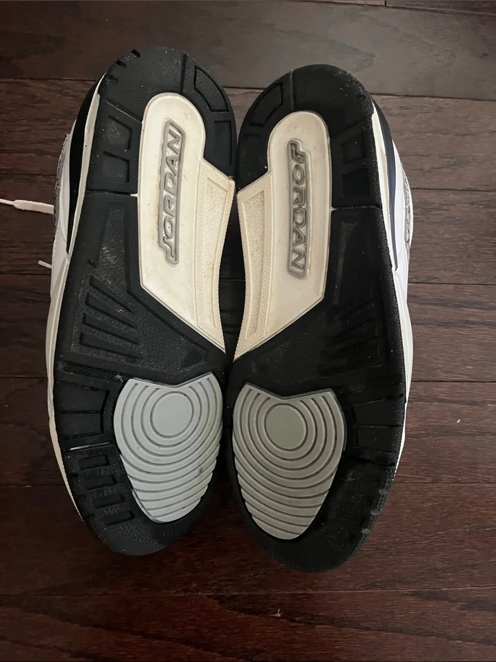 Nike White Low-Top Sneakers with Black Strap Accents
